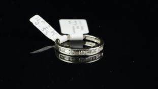 Diamond half eternity ring, alternating baguette and brilliant cut diamonds, estimated total diamond
