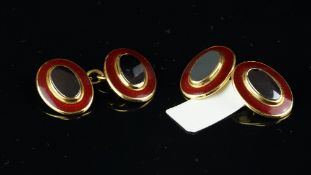 Theo Fennell oval gold cufflinks, central oval hematite with red guilloche enamel surround, chain