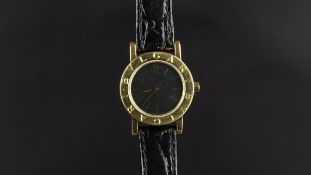 LADIES' BVLGARI GOLD WRISTWATCH, circular black dial with gold baton hour markers and hands, Bvlgari