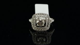 Diamond cluster ring, central round brilliant cut diamond weighing an estimated 0.75ct, estimated