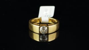 Single stone diamond ring, old cut diamond measuring an estimated 6 x5.8mm, in a wide yellow metal