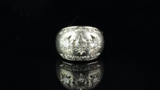 Diamond bombÃ© ring, set with three old cut diamond to the central panel and six diamonds set