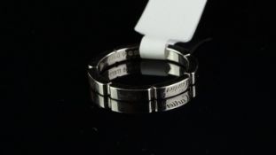 Cartier 18ct white gold band ring, with cut out detail to the full band, signed Cartier and