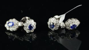 Pair of sapphire and diamond double cluster drop earrings, oval cut sapphire set horizontally,