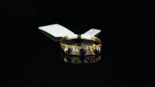Five stone sapphire and diamond ring, alternating sapphires and diamonds, set in 18ct yellow gold,