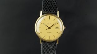 GENTLEMEN'S GOLD ZENITH DE BEERS GROUP WRISTWATCH, circular champagne dial with baton hour markers