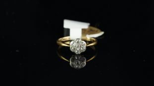 Diamond cluster ring, seven old cut diamonds, mounted in yellow metal stamped 18ct, ring size K