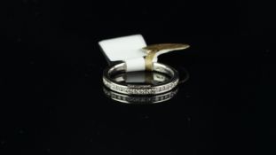 Diamond full eternity ring, round brilliant cut diamonds, channel set in platinum, ring size M