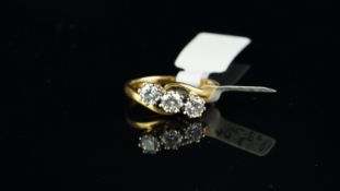 Three stone diamond ring, three round brilliant cut diamonds weighing an estimated 0.65ct, estimated