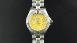 GENTLEMEN'S BREITLING SUPEROCEAN WRISTWATCH REF. A17345, circular yellow dial with 24 hr Arabic