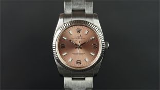 GENTLEMEN'S ROLEX OYSTER PERPETUAL AIRKING CIRCA 2008, circular salmon dial with white baton hour