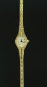 LADIES' ACCURIST WRISTWATCH, off white dial with gold hour markers, quartz movement, gold plated