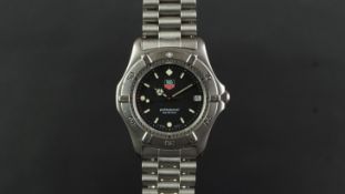 GENTLEMEN'S TAG HEUER PROFESSIONAL WRISTWATCH, circular black dial with luminous hour markers,