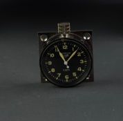 VINTAGE HEUER MASTER TIME 8 DAY DASH CLOCK, circular black dial with Arabic numerals and an outer