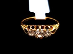 Victorian old cut diamond carved half hoop ring, three graduated old cut diamonds, in yellow metal