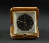 SMITHS T.S.T. TRAVEL CLOCK, tan leather case.