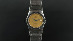 MID SIZE OMEGA CONSTELLATION WRISTWATCH, circular champagne dial with a date aperture at 3, gold dot