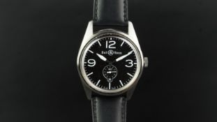 GENTLEMEN'S BELL & ROSS WRISTWATCH, a circular black dial with white Arabic and baton hour markers