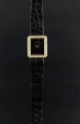LADIES' DIAMOND SET PIAGET, rectangular black dial with diamond set bezel, 20mm 18ct yellow gold