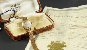 LADIES IWC GOLD WRISTWATCH W/ PAPERWORK, circular aged dial with gold hour markers on a 20mm gold