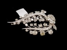 Diamond spray brooch, set with old cut diamonds, designed as an old cut diamond flower with