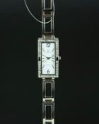 LADIES' PHILLIP MERCIER WRISTWATCH, rectangular white dial with silver hour markers, diamante bezel,