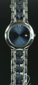 MID SIZE STAINLESSS STEEL WRISTWATCH, circular blue dial with dot hour markers, date aperture at