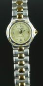 LADIES' LONGINES CONQUEST WRISTWATCH, circular champagne dial with silver hour markers and a date