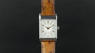 GENTLEMEN'S ETERNA 1935 DATE WRISTWATCH, rectangular silver dial with gold hour markers, inner