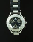 MID SIZE CARTIER 21 CHRONOGRAPH WRISTWATCH, circular grey logo covered triple register dial with