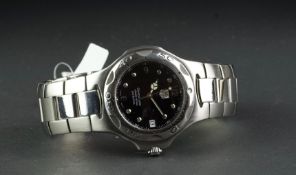 GENTLEMEN'S TAG HEUER CHRONOMETER REF. WL5111, circular black dial with dot hour markers and a