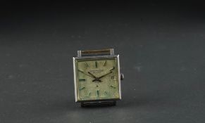 GENTLEMEN'S NIVADA GRENCHEN AUTOMATIC WRISTWATCH, square aged dial with baton hour markers and a