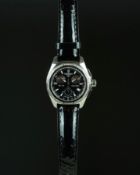 LADIES' TISSOT PRC100 CHRONOGRAPH WRISTWATCH, circular black triple register dial with silver hour