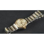 LADIES' OMEGA CONSTELLATION, circular white dial, with gold bevelled hour markers, diamond bezel, on