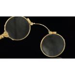 Pair of 15ct lorgnettes, with engraved detail to the handle, signed Theodore Hamblin Ltd London,