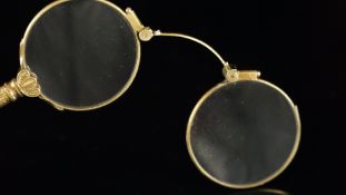 Pair of 15ct lorgnettes, with engraved detail to the handle, signed Theodore Hamblin Ltd London,