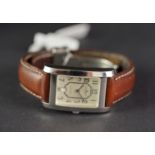 MID SIZE BAUME AND MERCIER WRISTWATCH, rectangular beige dial with silver arabic numerals, 24mm