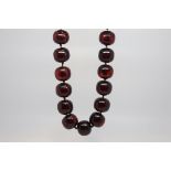 Large single row of vintage cherry amber beads, 25 beads approximately 18x16mm each strung