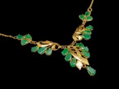 Emerald and gold necklace, designed as five sections, set with pear cut emeralds, on an integrated
