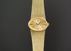 LADIES ROLEX 18K GOLD WRISTWATCH, oval gold dial with gold hour markers, 25mm 18k gold case with