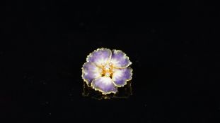Enamel and diamond flower brooch, six round brilliant cut diamonds set to the centre, with purple to