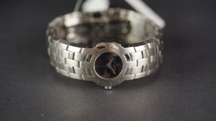 LADIES MAURICE LACROIX WIRSTWATCH, circular black dial with silver hands, on an intergrated bi