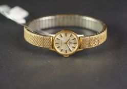 LADIES OMEGA WRISTWATCH, circular silver dial withgold hour markers, 20mm gold plated case with snap