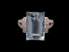 Aquamarine and diamond ring, baguette cut aquamarine weighing an estimated 5.32ct, with three