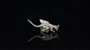 Diamond set kangaroo brooch, set with old cut diamonds and a cabochon ruby eye, mounted in silver on
