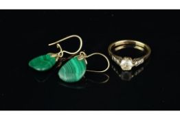 A yellow metal paste ring stamped 9ct, together with a pair of malachite drop earrings