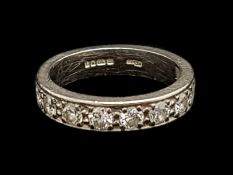 Diamond half eternity ring, seven round brilliant cut diamonds weighing an estimated 0.75ct, set