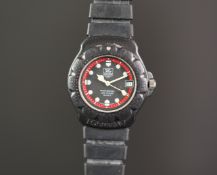 GENTS TAG HEUER PROFESSIONAL WRISTWATCH REF. 383.513/1, circular black and red dial with luminous