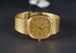 MID SIZE OMEGA DE VILLE WRISTWATCH, rounded square gold dial with gold hour markers and a date