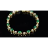 Emerald and diamond bracelet, set with alternating cabochon cut emeralds and polki diamonds,